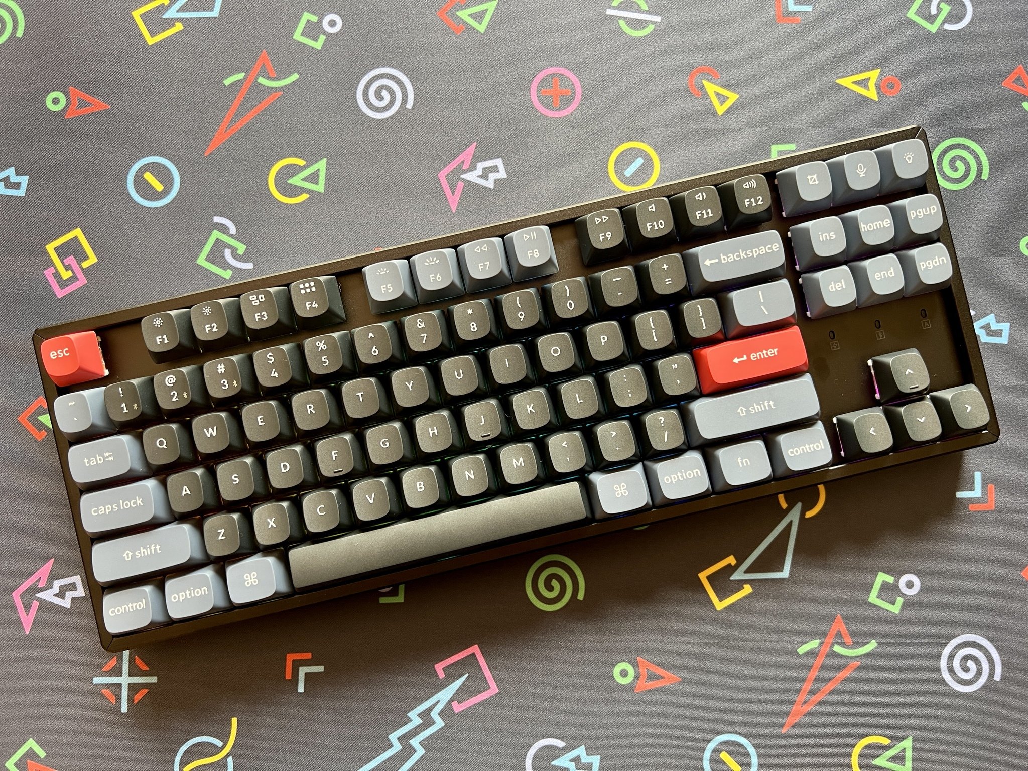 Keychron K8 Pro TKL wireless mechanical keyboard with RGB backlit keys and aluminum frame on a desk