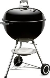 Weber Original Kettle 22-Inch Charcoal Grill, black porcelain-enameled bowl and lid on wheeled tripod stand