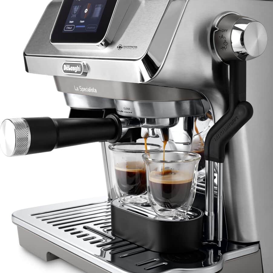 De'Longhi La Specialista Touch espresso machine with touchscreen and steam wand, pulling a double shot into two glasses